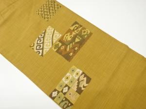色紙に抽象花鳥模様織出し名古屋帯
